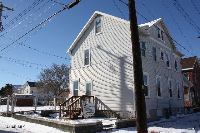 This house is being sold through the Altoona Planning Department, and being sold in it's present condition.  House has new siding, new roof, new windows, and new steps to basement, 2nd floor and attic.  There is a newer furnace and hot water tank. There is water, gas and sewer hook up to house but is turned off at this time.  Great opportunity for investors.  Bring in the offers, at this price with new siding, windows and steps, newer furnace & hot water tank this one will not last.