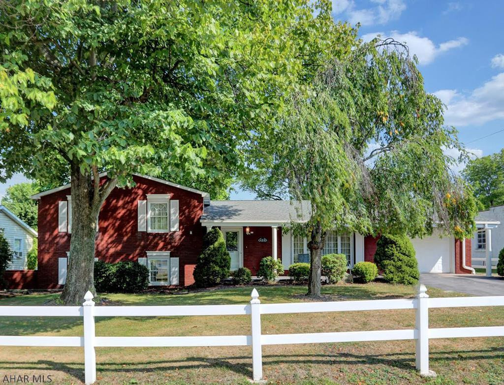 Call today to see this Spacious 3BR/2BA 1-Car Garage Brick home w/fenced yard! Enter this naturally lit home by first stepping into the foyer, living room w/wood fireplace, eat-in-kitchen w/cherry cupboards & Corian countertops, separate dining rm, family rm w/floor to ceiling windows & cathedral ceilings w/walk out to back patio for entertaining or backyard fun! Go up just a few steps to the 3BR's/1BA w/double vanity & Jack n Jill entrance into the Master BR. Finished basement includes: Great Rm for family game night or in-law suite, w/full bath, laundry rm w/door to back yard, small den/office/storage! Home has been freshly painted, split a/c sys, some new lighting, fenced yard, covered rocking chair front porch & storage shed incl. Easy access to I80 & rte 322, close to State College