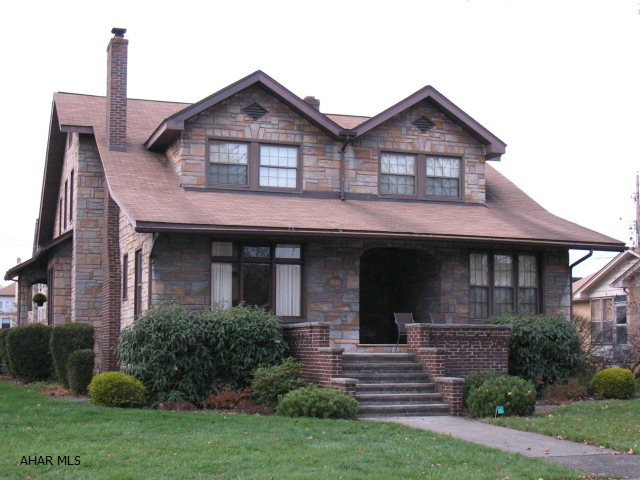 Lovely home situated in Columbia Park area.  Had been a duplex that was converted into a single family home offering 2 full kitchens, 2 living rooms, large master bedroom with french doors to office, 4 bedrooms, den that could be 6th bedroom, 2 3/4 baths, attached garage.  Laundry shoot from second floor to basement. Deck with privacy fence. The unique characteristics make this a must see.