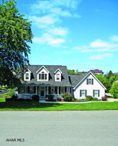 Custom built cape cod with many updates makes this a must see. Newer kitchen with cherry cabinets, granite tops, tile floor and appliances stay. The formal dining room features Brazilian hardwood cherry flooring. Don't miss the hide-a-way bonus room with skylights & private area. Fully finished lower level with custom built wet bar and an extra guest bedroom.  1 year home warranty included!