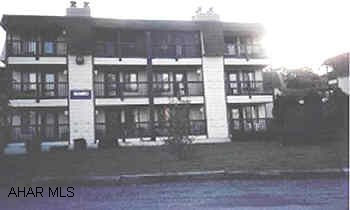 Third floor 2 bedroom condo. Assoc. dues of $175 per month include trash, cable, exterior maintenance, use of pools & tennis courts.