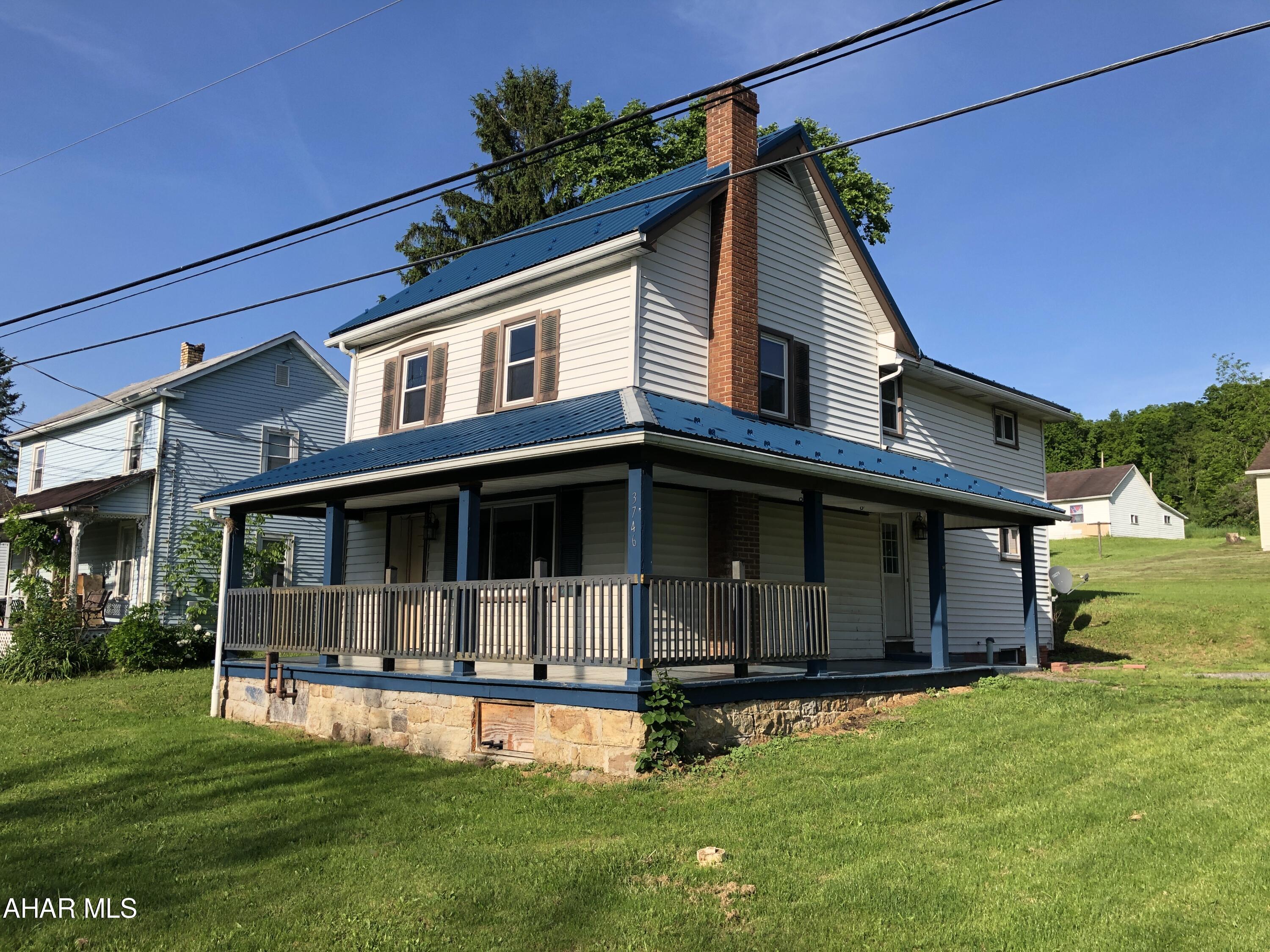 Located on the outer edge of the New Paris Borough, you'll find this unique home has a style all its own from the exposed logs in the original homestead portion. Enjoy the wraparound front porch and the convenient first floor laundry with half bath. The metal roof was installed in 2022 along with a new skylight. Thermopane windows throughout most of the home are an added plus. Recently used as a rental, it needs a bit of TLC, but could be a wonderful home. As Is/Where Is. Call to schedule your tour.