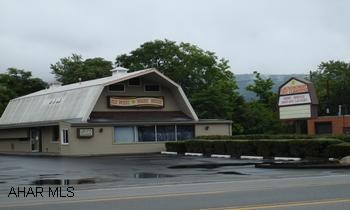 Old West Wash House laundromat. Real Estate and Business.