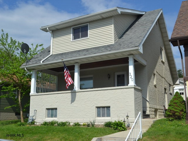 NEW LISTING-OPEN HOUSE Sunday, May 17th from 1:00pm-3:00pm.  Topnotch Two-Story: Super cute, Super clean, SUPER ready for Y-O-U!  This home has been updated and is sure to please all who walk through it's doors.  The downstairs has a renovated kitchen (Summer 2014) with new stainless steel appliances that stay and brand new carpet in the living & dining rooms (Spring 2015).  The upstairs has 3 nice-sized bedrooms, and an updated bath.  The exterior was just completely painted for the new homeowners-both the house & the 2 car garage in back!  The backyard offers a great place to grill or just relax this summer, & the front porch a serene setting to read or enjoy a little quiet time.  All that is needed is to pack up your things & move right in.  Call for a showing today!