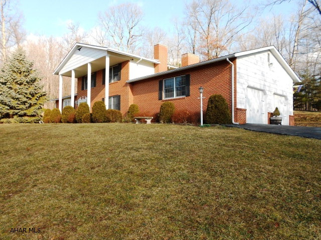 Large family home on one acre. Solidly built home with mature trees. Large patio. Four heat zones