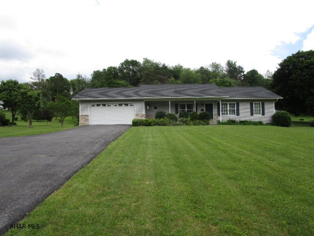 Very well maintained rancher built in 2000.  This home offers a living room with stone fireplace, kitchen with breakfast nook, dining area, master bedroom with master bath, two additional bedrooms with a full bath and first level laundry room.  Full basement, two-car attached garage, macadam driveway and storage shed.  Heat pump with central air conditioning, public water and sewer, thermo pane windows and 200-ampere electric.  Large front covered porch and rear deck.  Nice level yard containing .493 of an acre.