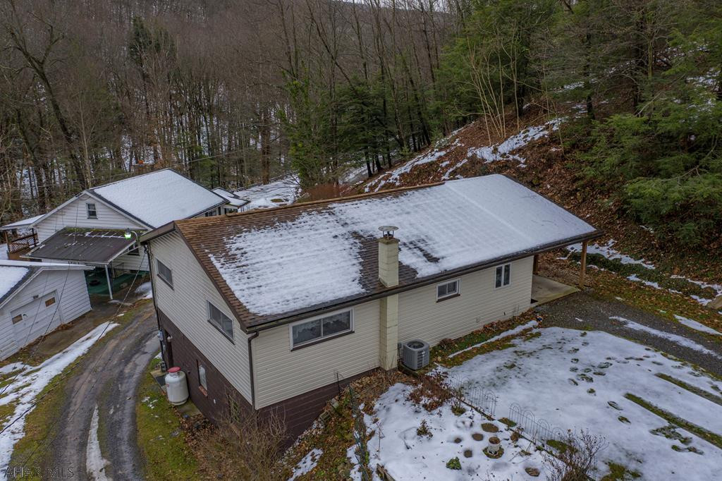 Well maintained 2 bedroom, 2 bathroom raised ranch home situated on an 1.5 acre private setting in Sinking Valley. Some of the features include an attached oversized garage, updated kitchen and baths, and patio leading to a deck with a mountain view. Also includes central air conditioning, gas fireplace and a shed. Located in close proximity to State Game Lands, Sinking Valley Country Club and Fort Roberdeau. Check out our 3D virtual tour and schedule a showing today.