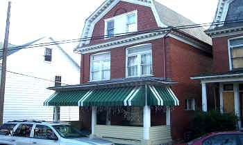 Solid 3 story brick near Altoona Hospital. Wood fireplace, newer furnace, 3rd floor has four 8x11 bedrooms. Roof in good shape.