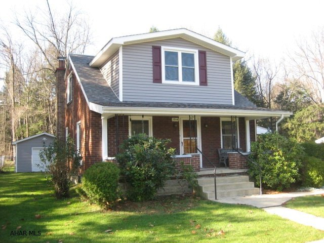 BRICK CAPE COD STYLE, HARDWOOD FLOORS, ON LEVEL FENCED LOT