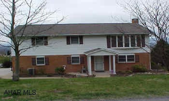 Raised Ranched w/New Roof-Painted Trim-Lg Double Deck,2-Car Garage,Shed with Garage Door & opener for Lawn Equipment. Well Maintained Raised Ranch ,Spacious Family Home with a Gorgeous View of Hollidaysburg & Surrounding Area.Oak Kitchen- Open Living Room, Dining Room,Tile Kitchen & Bath Floors.