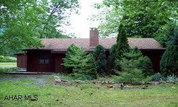 See Comments Terrific Opportunity and Hard to Find Property!  Two-three bedroom ranch has a get-away cabin feel with open floorplan and much, much privacy on 10.68 acres!  Wooden cathedral ceilings in LR, DR, Kit combo area.  Replacement windows, newer shingle roof.  Some wooded acreage, some open and a stream!  PLUS a small cabin with electric!  Close to White Sulphur Springs!  This won't last a minute!!  Call today!!