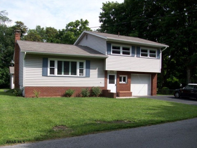 Absolutely immaculate 3 bedroom 1.5 bath home on Broad Ave.  This home has so much to offer from the large yard, screen porch, and oversize 3 bay 30x40 ft. garage with a 14 ft. tall door for boat or RV storage.  It's move in ready!