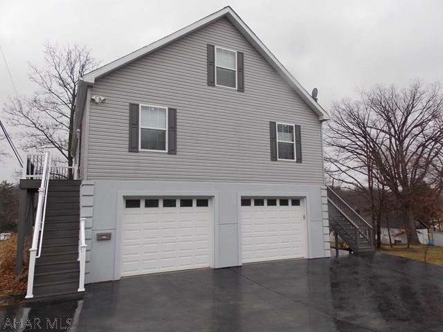 Like new 2BR/2BA home in a very convenient location. Buy it now and watch the fireworks from the large deck this July 4th. You will love the Master suite with walk in closet and private bath. Along with the guest room and second bath there is also a home office on the main floor. The second floor can easily be finished for many uses, bonus room/family room, bedroom or what ever space your family may need.The garage/basement area is huge and the ceilings are very high to add more living space. The seller added Dryvit to match the siding and a large stamped concrete driveway to finish off the exterior. Call today for a showing of this almost new home  in Logan Township. Possible delayed possession until mid April.