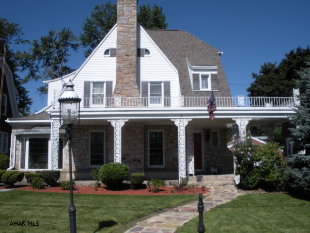 Elegant home near Penn State Altoona Campus.  Stone & Vinyl exterior with loads of curb appeal.  Hardwood floors, Cherry kitchen, large family room on main floor plus finished lower level with bar & 1/2 bath, finished 3rd floor.  Newer roof, furnace & central AC tons.  Tons of Character & charm, 3 car detached garage.  Interior French drain with lifetime guarantee.