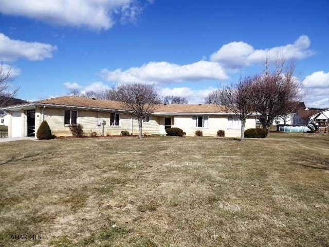 Sprawling brick ranch w/ newer improvements of flooring, carpeting, chimney liner, resurfaced kitchen counters, sink, and disposal. Combo heaters w/ electric baseboard, electric radiant wood burner insert, vaulted and beamed living room and family rooms. Great location, lovely setting.