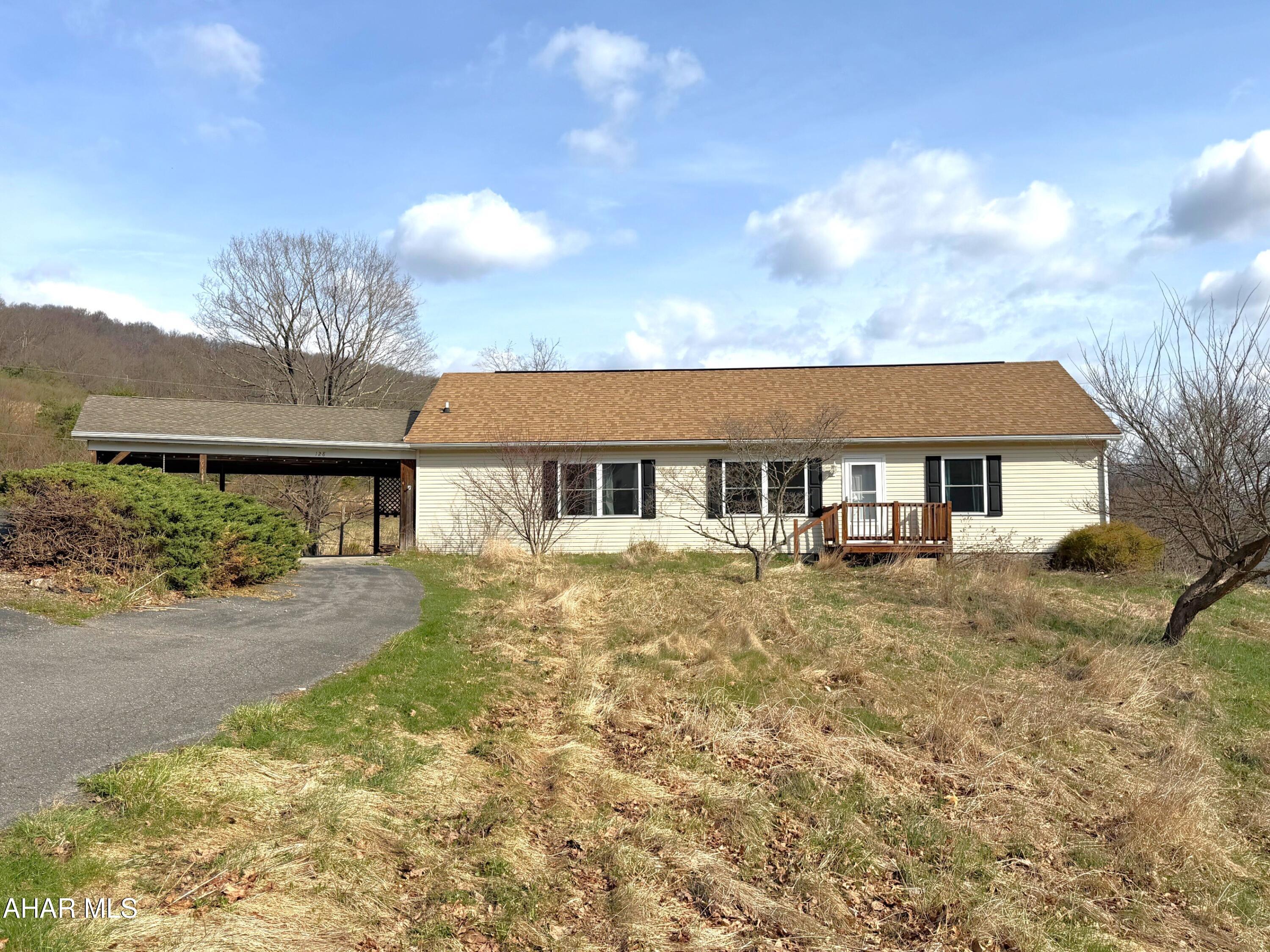 This ranch home offers a living room, kitchen with breakfast nook, dining area, primary bedroom with double doors, a walk-in closet and ensuite bathroom, two other bedrooms, a main hallway bathroom, and a first level laundry area. Full walk-up attic that is floored for loads of extra storage and a full walk-out basement. Two-car attached garage and a two-car attached carport. Oil or coal hot water heating system, central air, 200-amp electric, well water, and public sewer. Storage shed and paved driveway. Spacious 2.04-acre lot with some peaceful country views. Nice location just 10 minutes from the PA/MD border and less than 30 minutes to Bedford or Rocky Gap State Park.