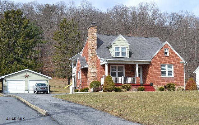 Immaculately maintained brick cape cod on 3/4 acre lot just outside of Bedford.  Relax on spacious outdoor living area off the main and second floor. Two car heated garage and separate carport.  3BD/1.5BA with updates throughout the home.  Oak kitchen with appliances included, newer carpet, original oak hardwoods in good condition, first floor master.  Exceptional use of storage, walk-in closets.  2nd floor could be private suite, with access to large covered porch.  Partially finished basement, with all modern utilities and central AC.  An absolute must see!