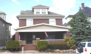 Super stately 2 1/2 story with a traditional american flare. Newer roof, windows and insulation, master bedroom with walk-in closet, fireplace in living room (nonfunctional), 3 bedrooms, finished attic could be 4th bedroom (with wall heater), 2 car garage, 3 tier deck with ABV ground pool.