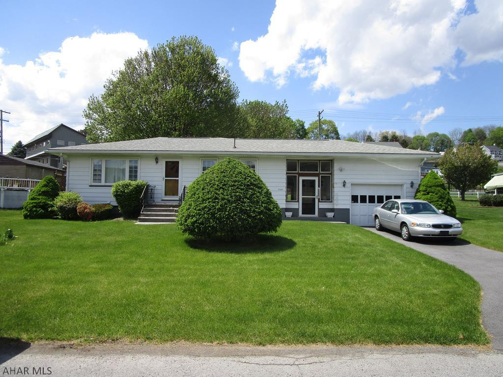 Attractive 2 bedroom rancher in Pleasant Valley. Oak kitchen, good sized living room, breezeway connecting garage, Large screened in rear patio.  Basement is mostly finished with half bath, summer kitchen and family room. 75x120 lot with blacktop drive. Great home for the $$.