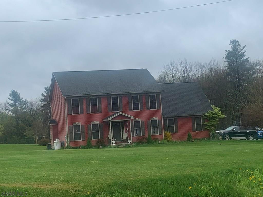 Beautiful modern two story home in a nice rural location on 10.1 acres. The home appears as new and features a oak kitchen, family room with fireplace off the kitchen, formal dining room, living room and half bath on the 1st floor. The second floor has 4 bedrooms, full bath and a full bath off the master with walk in closet. Full basement and attached two car garage. Country living at its best!