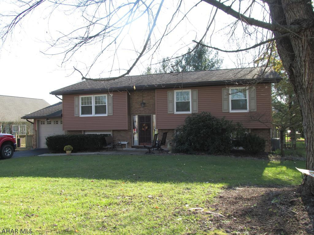 Nothing to do but "move in" to this immaculate split entry in Oldtown Village and make it your own - walk to Frankstown Elementary School.  Enjoy the multi level deck overlooking a pristine level lot complete with a 10x13 shed.  This well cared for home has lots of entertaining space - FR w/woodburning FP, DR has sliding door to covered deck.  New windows & siding, roof 30 yr shingle (10 yrs), new 500 gal buried oil tank, new well tank.  1 car attached garage.  Don't wait - owner says sell!!  Perfect family home!
