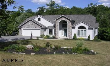 Two story built 1999, walk-in closets, security system, eat-in-kitchen, large deck w/sunroom, master bedroom on 1st floor. Beautiful 4 bedroom, 2.5 bath located in Frankstown Township. Custom built. Professionally landscaped with pond. Call Ted Manna 207-7018 to see.