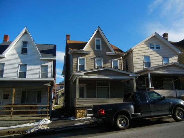 Solid 3 bedroom 1 bath two story with 2 car detached garage. Newer siding. Hardwood floors. A nice property. Take a look!