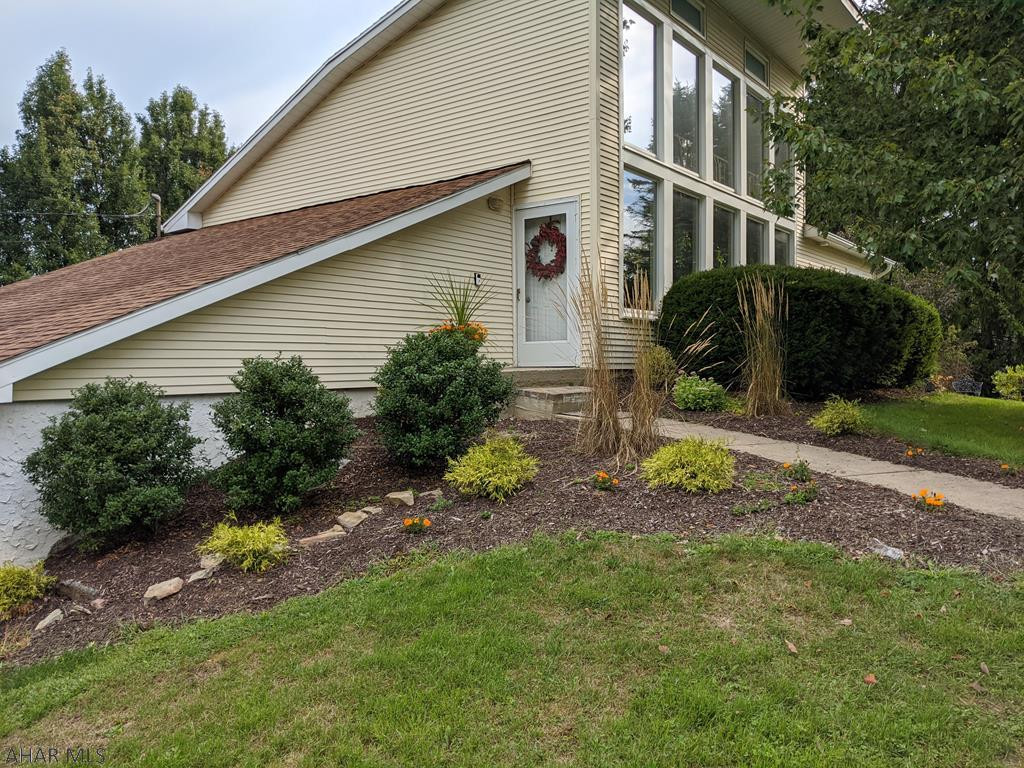Unique, contemporary eco home in Stormstown subdivision! Minutes from State College, in SCASD! Corner lot w/passive solar design provides winter warmth & plenty of natural light. The open floor plan includes modern kit w/granite counters, maple cabinets, stainless appliances and bamboo fl. Beam loft above the LR is bright, must see area! Walk-out basement includes 4th BR, 1/2BA/laundry, storage room & home office/fam room w/wood stove. Enter lower level from the attached garage or stamped concrete patio, covered by large upper deck. Fantastic for relaxing or entertaining on 1.10 AC landscaped prop w/healthy, mature shade trees; fenced vegetable garden and ample open space. 10 minute walk to newly refurbished Autumn Meadow Park and State Game Lands #176.