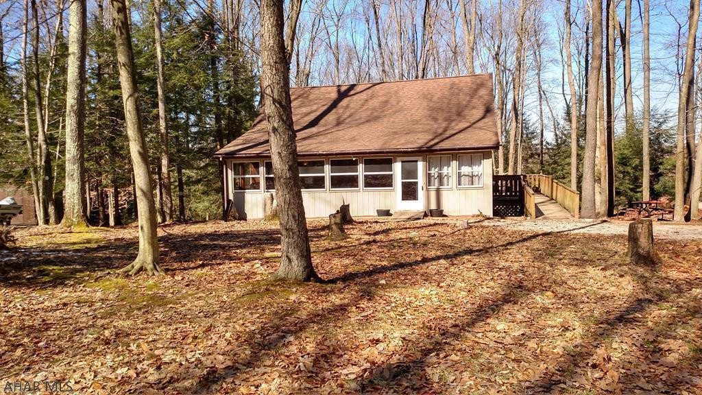 Don't delay scheduling an appt. to tour this nicely renovated cottage about 1/4 mile past the entrance gate to Glendale Yearound.  Across the street are 782 acres of State Game lands.  There are no HOA fees.  If the new owners want to utilize the facilities at Glendale Yearound, they can pay about $510/year for that privilege.  Features include:  new engineered vinyl plank floors on entire 1st floor (2017), new laminate flooring on the 2nd floor (2015), new kitchen cabinets (2017), new appliances (2016), remodeled bathroom (2017), new ceiling & walls in the kitchen and bathroom (2017), new recessed lighting (2017), a freshly painted exterior (2017), and handicapped accessible.  Everything is on the 1st floor except for the loft. You'll love the layout, colors, & decorating. Priced to sell.