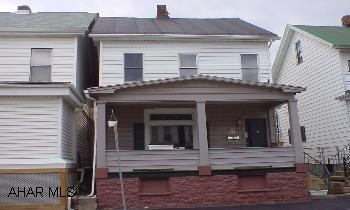 2 story frame w/ vinyl siding.  $500 selling bonus Great for 1st time  home buyers, newer kitchen, carpet, and furnace, 1st floor laundry and 1/2 bath,  good mechanics, little TLC would make this a nice home.  Being sold "AS IS", "WHERE IS".  $500 selling bonus.