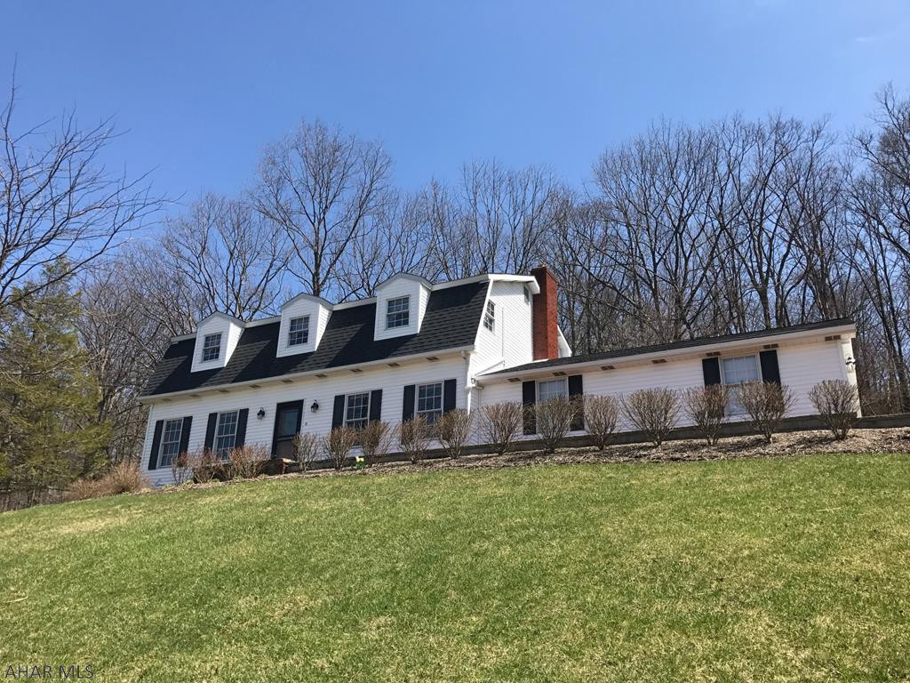 What beautiful views this property has to offer. Home offers 3 bedrooms and 2 full baths. Beautiful wood floors, plus wood fire place. This home also offers a two car attached garage, plus 2 car detached garage.