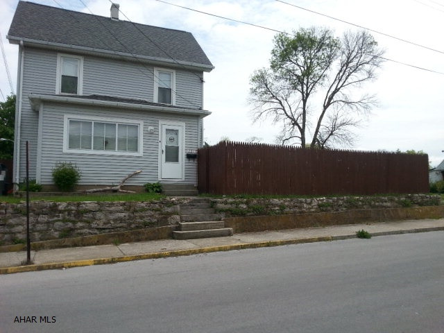 Newer roof.  Updated kitchen, modern bath with claw foot and separate shower stall.  Replacement windows, new furnace and A/C.  Bonus room on second floor could be a third bedroom.  Interior of garage is finished.  Privacy fencing.  Hookups for a hot tub.