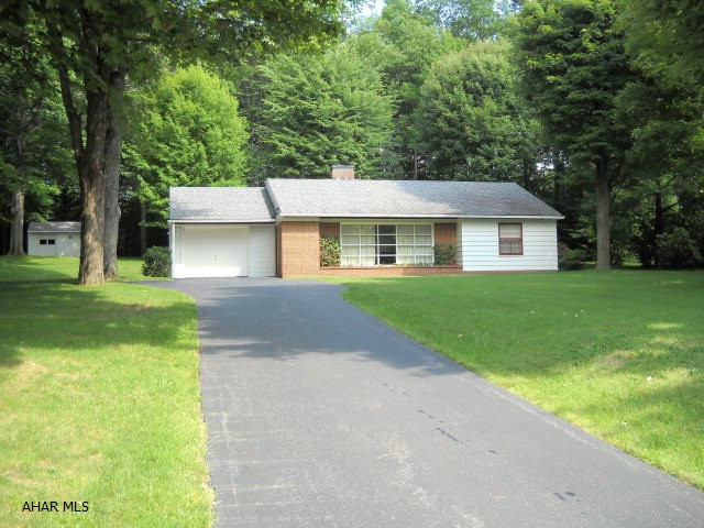 Meticulously kept 3 BR home in Cresson Twp, with adjoining lot to Rodgers Ave! Ceramic tiled kitchen & bath with many unique features. Living room boasts a picture window, built in book shelves & fireplace. LARGE lot ith turn around drive way & private stone landscaped patio area with many more extras! Qualified buyers only.