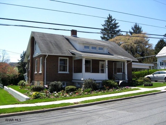 Classic 3 to 4 bedroom brick Cape Cod located within 2 blocks of Historic Downtown Bedford. Large basement family room. Newer kitchen and windows. Much desired first floor bedroom. Great front porch with picturesque view. Includes all appliances. Very nicely landscaped. Ready to move in!
