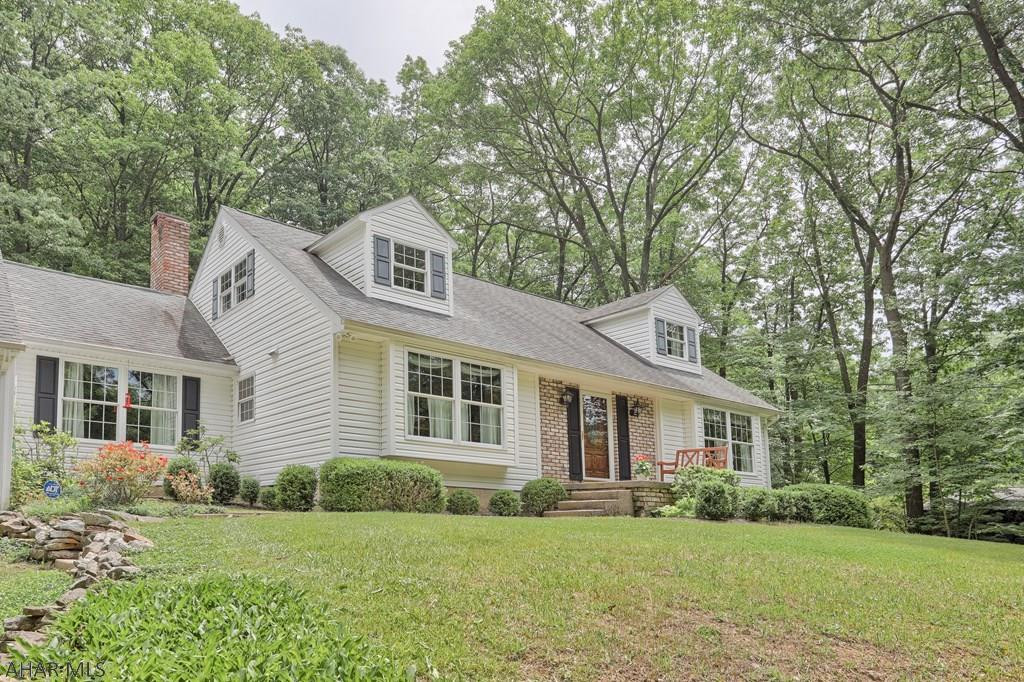 Take a step into this incredibly maintained, single owner home and be wowed by the endless possibilities of this magnificent residence!  The property is nestled into the valley of Homer's Gap and sits on 2.64 acres.  It boasts 5 bedrooms (or an office), 2 full baths, 2 separate living areas, wood Burning fireplace, amazing woodwork throughout, and more storage space than you can fill!  Enjoy evenings on the covered patio watching the deer and other animals that stop by in the summer, walk in the woods on the walking paths during fall, or cuddle up by the fireplace in the winter. Outside features a carport and oversized 2 car garage with Loft, as well as RV parking! Don't miss your chance to own a little piece of tranquility with this immaculate property.
