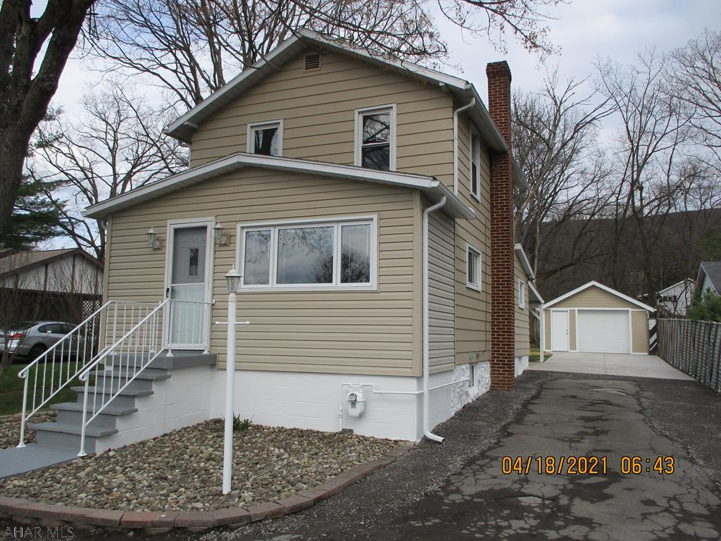 Newly refinished interior, this cozy two story in Greenwood is the perfect starter home.  Three bedrooms, newer furnace and water heater, recently remodeled kitchen, newer windows.  Covered patio at rear for your summer picnics and family gatherings.  Spacious one car garage and parking for several cars.  Private well, but Logan Twp. sewer service, $53 per month.  Quiet location - call for your personal showing today!