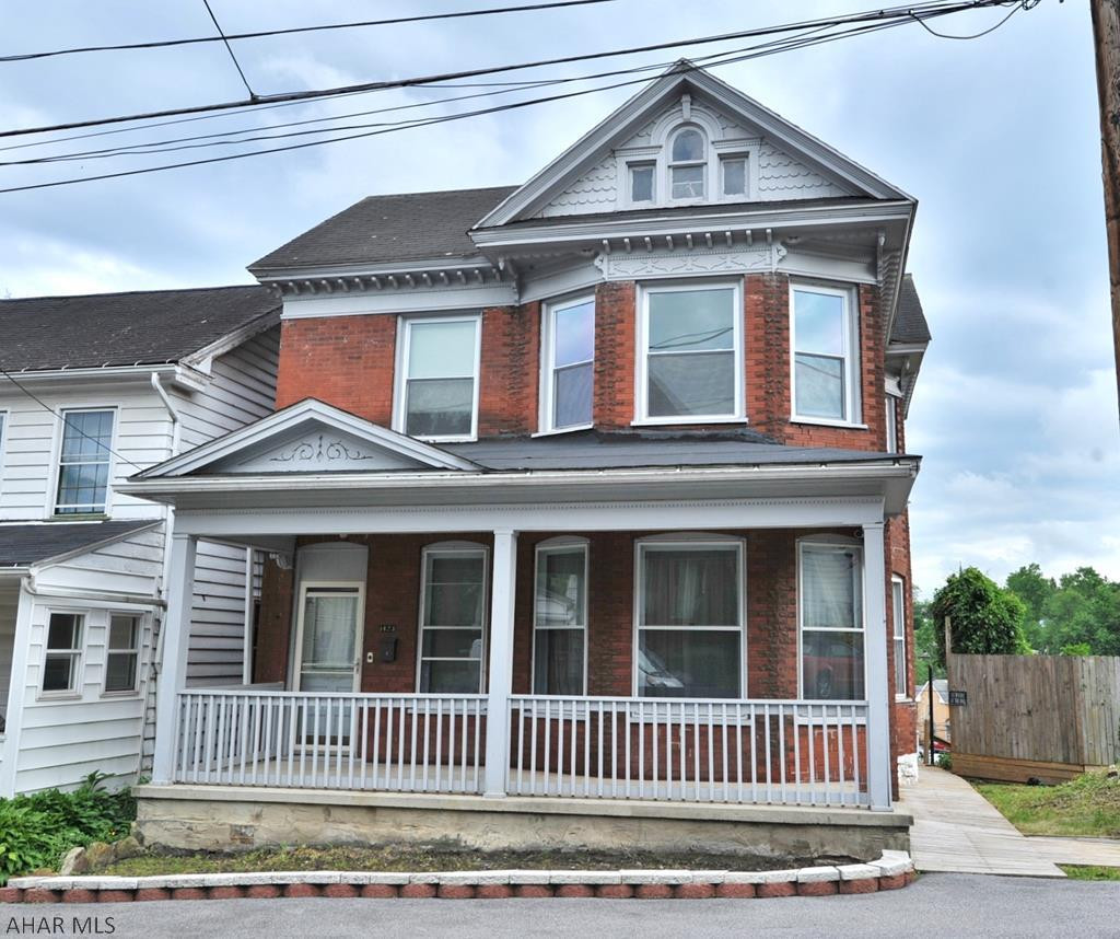 Do not miss this opportunity to own a large 3 bedroom 1.5 bath home that is located in the city on 2 large lots!!! This house has beautiful unique woodwork throughout with an abundance of character and charm!   With some finishing touches, this could make the perfect starter home or investment property. There is plenty off of street parking.  It has a HUGE backyard that is fenced in off of the back deck!  Priced to sell quick!   As is sale.