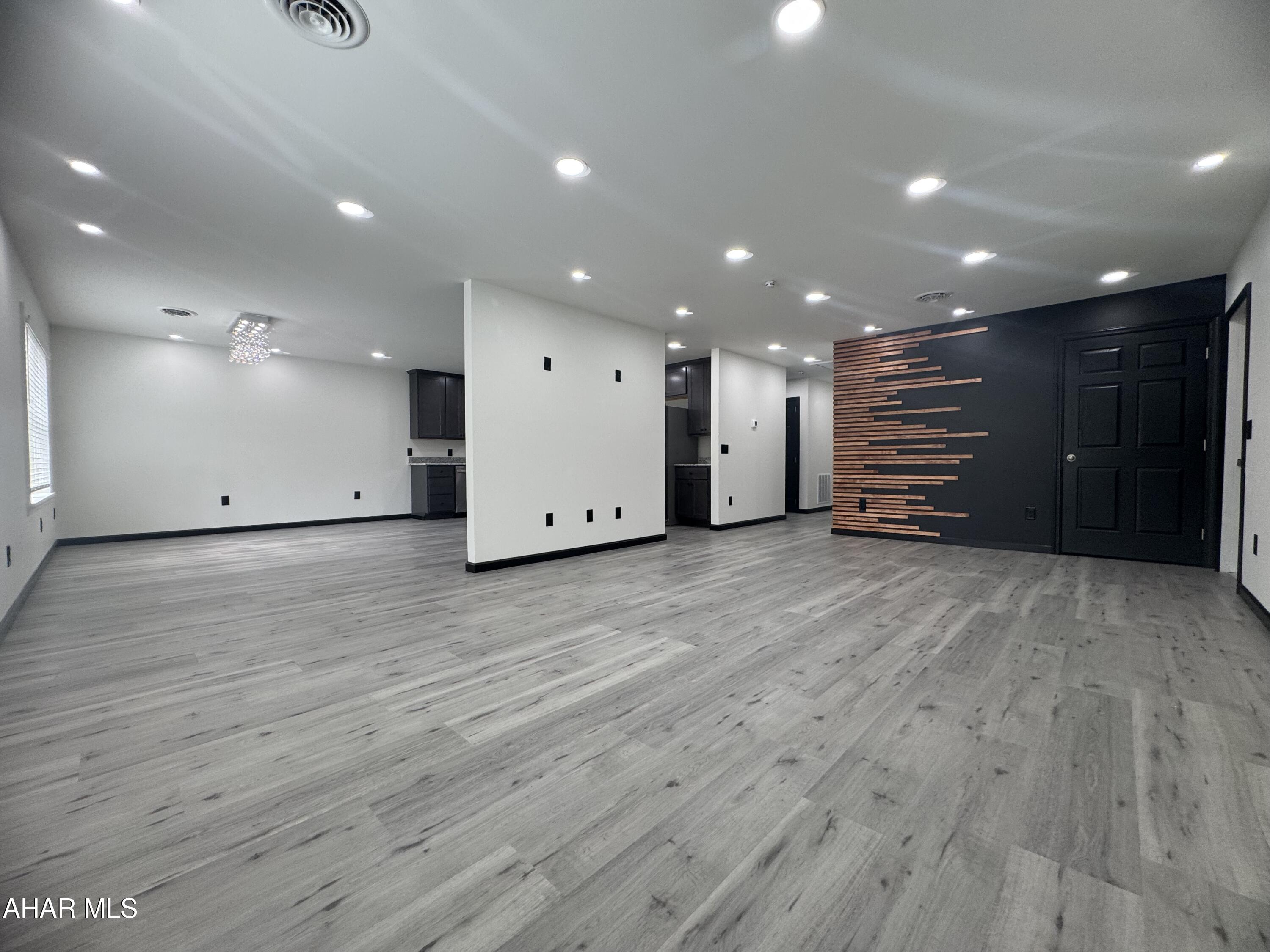 Welcome to this newly remodeled, luxurious, second floor studio apartment! You will be completely captivated by how stunning it is! Countertops are granite in the kitchen and bath, modern lighting and design, you will want to move in right away! Rent includes water, trash and parking. Tenant pays electric.