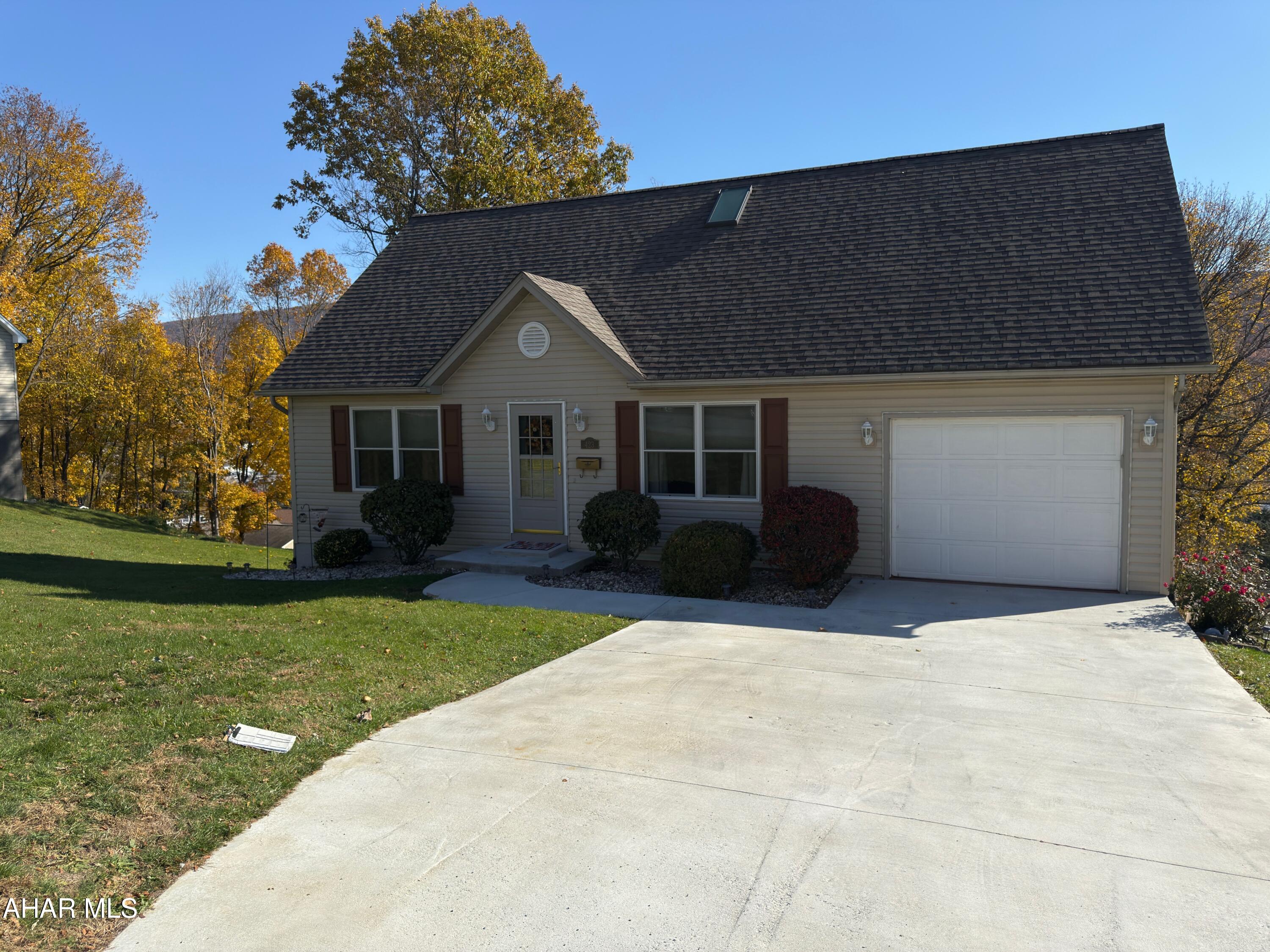 Your Move-in Ready New Home!
Discover this stunning, freshly painted 3-bedroom, 2-full-bath home in Altoona, where comfort meets convenience. Situated on a rare double lot, this property offers privacy in the expansive backyard, creating your own personal sanctuary. All you need to do is unpack and start living!
The main level is thoughtfully designed for easy, single-level living. Step into a large, cozy living room that flows seamlessly into a lovely dining room, perfect for everyday dinners or entertaining guests. Doors from the dining room open directly onto a spacious deck, ideal for indoor/outdoor entertaining.
The wonderful kitchen boasts sleek stainless steel appliances and abundant counter space, ready for your culinary adventures. Practical first-floor amenities include a full bathroom, a comfortable bedroom, a large walk-in pantry, and a conveniently located laundry room with easy access to the garage.
The second floor hosts two additional large bedrooms, each featuring ample closet space and sharing a second full bathroom.
The home's lower level is an entertainer's dream. A beautifully finished family room centers around a cozy gas-fired fireplace, providing the perfect ambiance for movie nights. The showstopper is a custom bar that must be seen to be believed—an ideal spot for hosting friends and family. Doors lead directly from the basement family room to the rear patio, connecting the indoor gathering space with the privacy of the quiet outdoor area.
Organization is a breeze with two large storage areas, where all shelving will remain. A dedicated workbench and a convenient walk-in closet provide all the space you need for hobbies and storage.
Key Features:
3 Bedrooms, 2 Full Baths
Rare Double Lot in the City
Freshly Painted Interior
First-Floor Primary Bedroom & Full Bath Option
Finished Basement with Gas Fireplace & Custom Bar
Seamless Indoor/Outdoor Living (Deck & Patio Access)
Abundant Storage & Workbench Space
Move-In Ready Condition - Needs Nothing!
This meticulously maintained home is waiting for you and your family. Schedule your private showing today and envision your life in this exceptional Altoona home!
