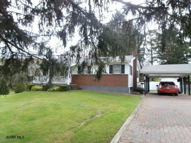 Very clean and well maintained rancher. Eat in kitchen, good sized living room. Basement family room and bath. Side yard. Attached carport with paved drive. Quiet street.