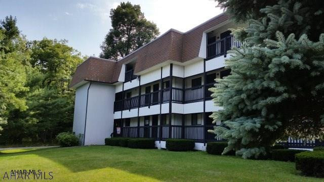 Great 2nd floor end unit with extra side window for more lighting and additional view. Fully furnished 2 bedroom, 2 bath condo. Amenities include: indoor and outdoor pools, hot tub, tennis courts, exterior maintenance, snow plowing, and trash removal. Dues $234.00/mo.  #J-377