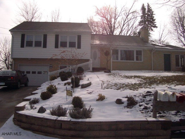 Immaculate split level home one mile west of Bedford in Orchard Heights.  3-4 bedrooms, 1 3/4 baths, full finished basement, integral one car garage, tons of storage, walk up attic, sun room, screened in porch, beautiful landscaped lot, newer kitchen, turn key condition. Home offers a HOME WARRANTY!