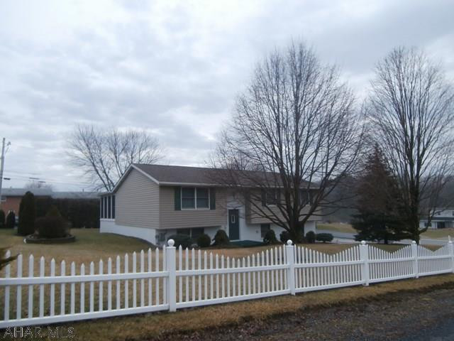 Beautiful Bi-Level home with great curb appeal. Beautiful cherry kitchen with appliances, large living room, bath includes ceramic floor, 16x16 sunroom addition with lots of windows for light, family and laundry/1/2 bath. Concrete drive and 2 car int garage. Invisible fencing for the dog!  This home is in as new condition with quality work being done by Eger Construction.