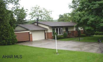 ONE STORY LIVING.  SCREENED PATIO & REAR DECK. HARDWOOD UNDER CARPET. WATCH THE DEER IN YOUR OWN BACK YARD. REALTOR IS RELATIVE OF SELLER.