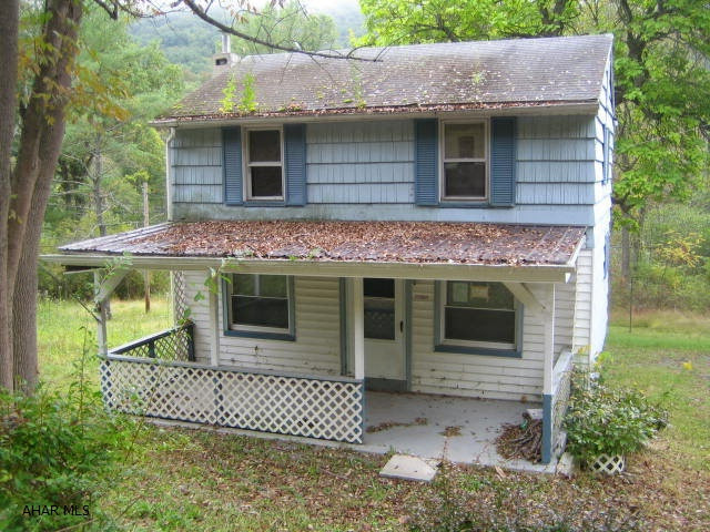 Standing Stone area 2 story home on half acre, private lot. Large kitchen with dining area, formal living room. Large covered rear deck. 2nd bedroom is captive. Needs TLC, but lots of potential for the right buyer. Property is being SOLD AS-IS and is subject to HUD Guidelines 24 CFR 206. 125.