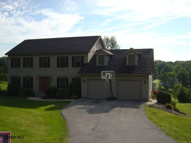 Pristine home features. Spacious rooms throughout. Large eat in kitchen opening into great room with fireplace. Formal dining room.Living room.  First floor laundry.  Master bedroom suite. Jacuzzi tub. 4 bedrooms, 3.5 bathrooms, family room in basement, additional kitchen in basement, screened in deck.  Fox inground pool. Private.6 acre lot with a view.