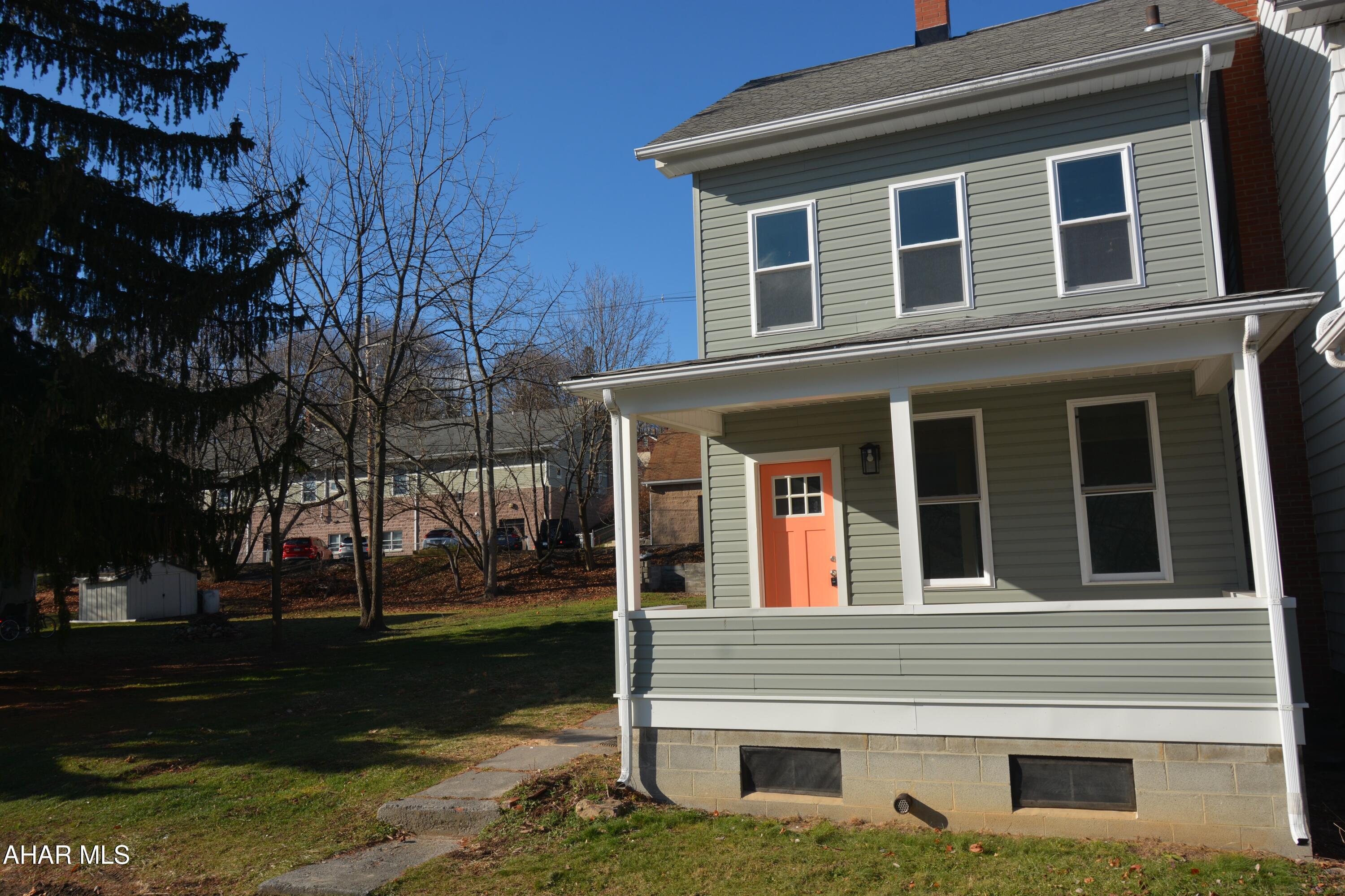 LOTS TO LOVE ON LOGAN! This 3 BR (with the potential for a 4th) | 1.5 BA home is ready to welcome its new homeowners. Step inside through the cheery front door, and you'll instantly appreciate the extensive updates that have transformed this space into a warm and inviting haven. New drywall, flooring, and lighting create a bright, fresh atmosphere, while a tasteful coat of paint unifies the home's aesthetic throughout. The living room offers natural light and a  custom wainscoting-style accent wall.  As you move into the dining room, you'll find some character in the history of the home with an original built-in cabinet still standing. In the kitchen you'll see new cabinets, solid surface counters, a sleek backsplash, and brand-new SS appliances. You'll also find a convenient half bath and a laundry/mudroom just off this.  As you venture upstairs you'll discover brand new neutral carpeting throughout.  The full bath has been thoughtfully updated, with a chic new vanity and a nicely tiled tub surround. The first bedroom offers generous natural light, while the second bedroom provides a cozy space tucked off the hallway. The third bedroom includes a custom wall, a spacious walk-in closet, and an additional bonus room that can easily adapt to your lifestyle—possibly perfect for a home office or additional closet/dressing room. Further adding to the home's appeal, the attic has been recently drywalled, now complete with heating, offering endless possibilities for your personal touch up here.  The home has BRAND NEW siding, windows, and exterior doors.  Central air was also added as well as many of the mechanicals (plumbing & heating) updated throughout.  As we stated - LOTS TO LOVE!  Disclosure: Sellers each possess a PA real estate license.
