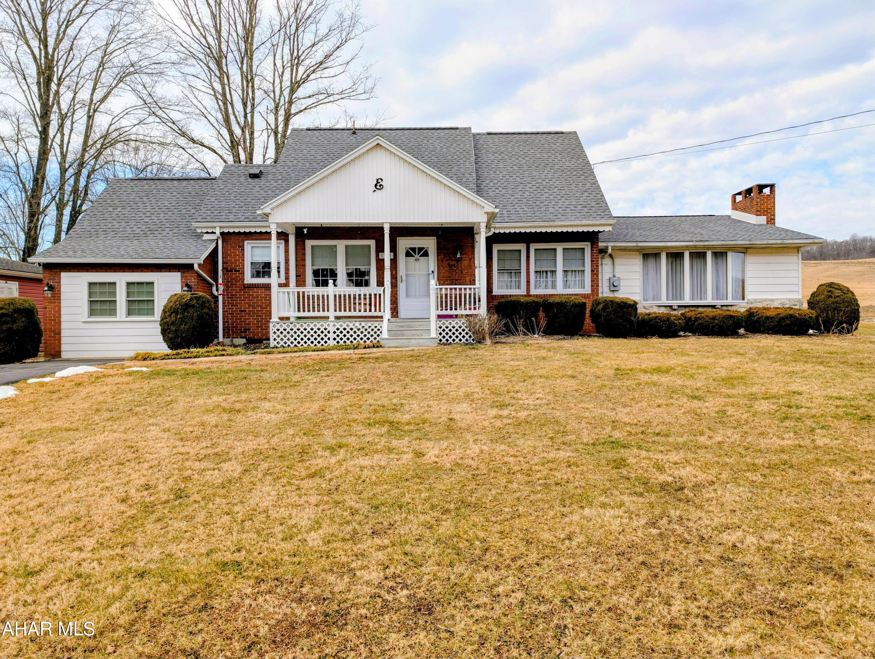 Charming brick, stone and vinyl cape code that is beautifully maintained. Featuring a 4-bedrooms, 2 full baths nestled on 1.65 scenic acres in Buffalo Mills, within the Bedford Area School District. 
Relax and unwind on the covered front porch -- perfect for morning coffee and porch swinging. A paved driveway and attractive curb appeal set the tone as you arrive.
An eat-in kitchen features large built-in cabinetry for storage and a small mudroom for easy access to the covered stone patio and back yard. The dining room sits at the heart of the home, creating an inviting space for gatherings and entertaining. The oversized family room boasts a stunning stone, wood-burning fireplace -- ideal for cozy winter evenings and supplemental heat.
The main level includes two bedrooms with original hardwood floors and a full bath with a walk-in shower. The former single-car garage has been thoughtfully converted into an additional bedroom, complete with knotty pine walls and ceiling, plus a closet for storage.
Upstairs, you'll find the fourth bedroom with hardwood floors, abundant built-ins, and generous storage space and a full bath with walk in shower.
Features of this home include: new shingle roof (2024); 6-year-old well (installed by Clarks); 3-year-old sand mound system; 200-amp electric service; leaf guard on the gutters; a paved driveway; and a two-car detached garage.
Conveniently located between Hyndman and Bedford, enjoy an easy drive to either Cumberland or Bedford for shopping, dining, and everyday amenities.
This well-cared-for property offers space, charm, and practical updates -- truly a wonderful place to call home!