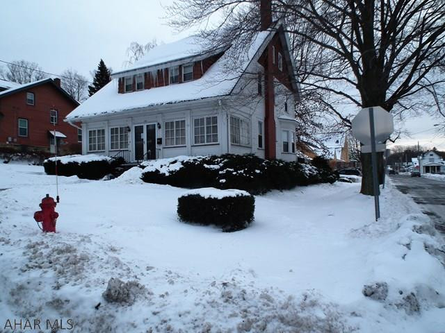 Family Valentine-Forget The Chocolates I'm Yours! Don't miss out on this corner lot home that invites family and friend's enjoyment. Home has 4-5 bedrooms, loads of closet space with additional finished area in attic for 5th bedroom and office or play area. Updated bathroom 2nd floor with 1/2 bath on 1st floor. Spacious kitchen with eating area and a nook area for reading or just enjoying scenery. Large living room with fireplace extends family and friend entertaining. Welcoming foyer area leads to enclosed porch for the spring thru fall enjoyment. Newer detached garage. Close to playground, schools and church! Don't miss out, call today for your showing.