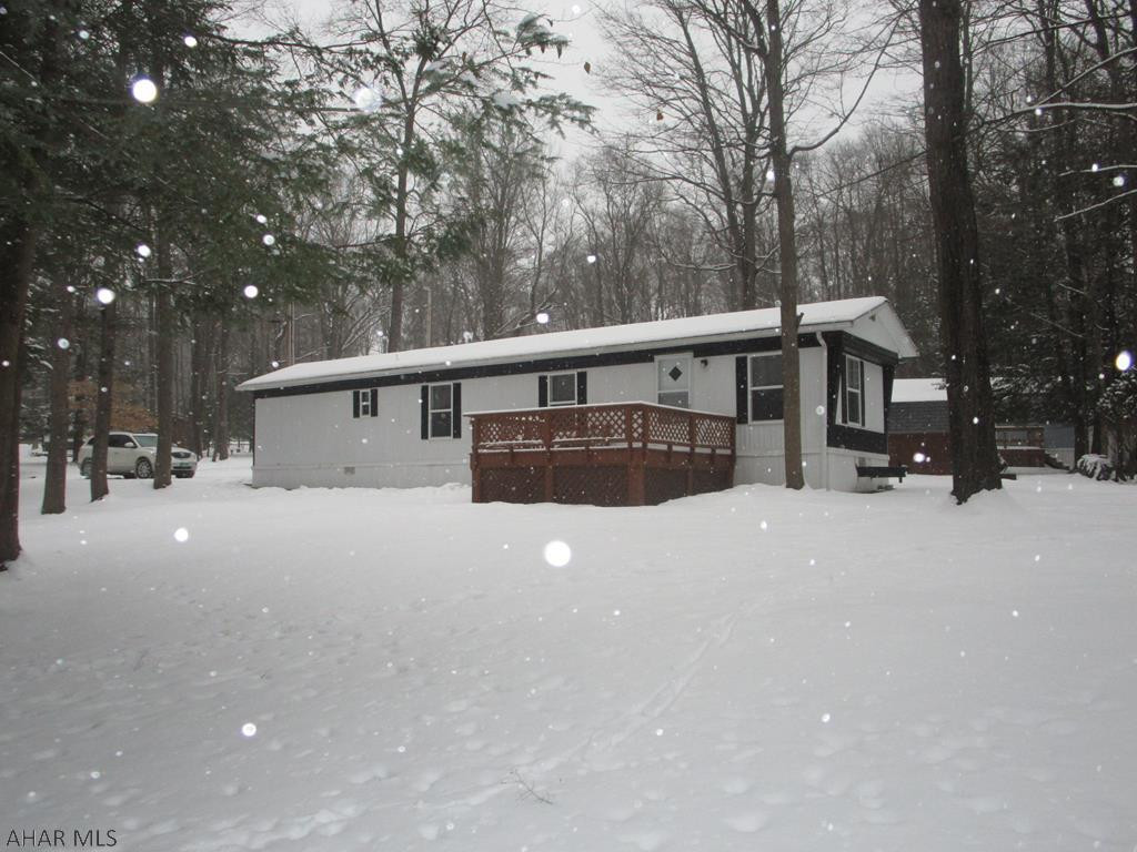 Well maintained two bedroom mobile home on large corner lot over 1/3 acre.  Home has newer roof and windows and is newly painted.  Located in Glendale Yearound.